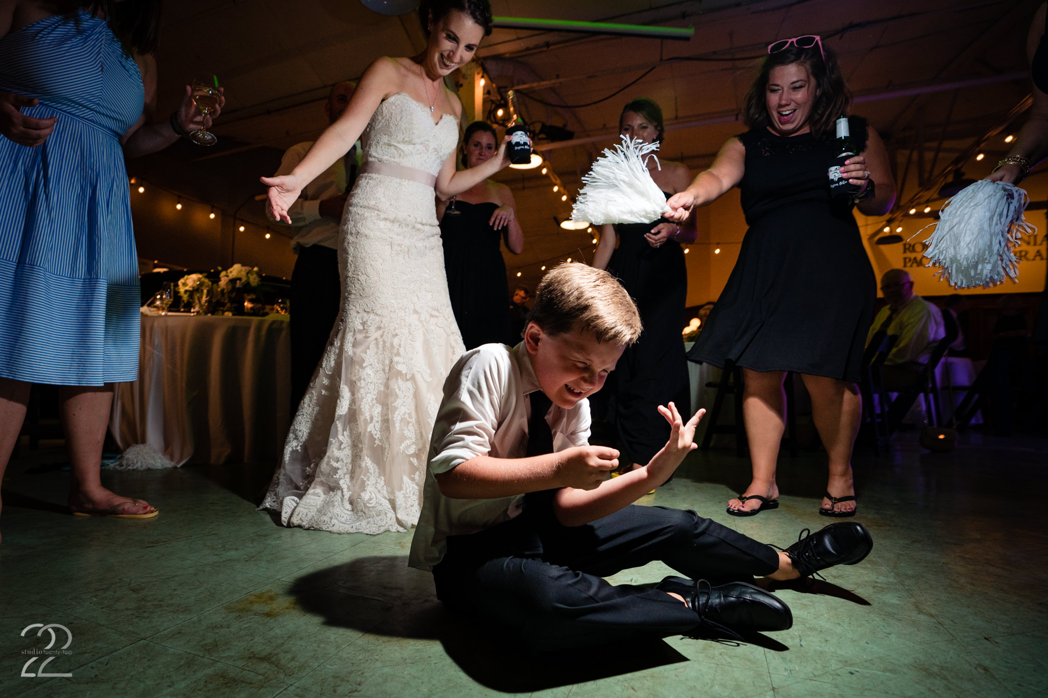  Expect the unexpected and those golden moments will happen. This is part of Megan’s philosophy (that and always keep and eye on the kids because they are the true life of the party). Be certain that if Studio 22 is photographing your wedding they won’t miss a beat of your epic dance party! 